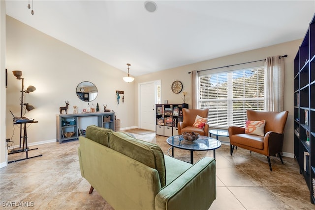 living room featuring vaulted ceiling and light tile patterned flooring