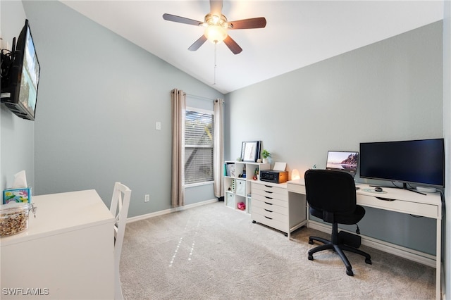 office with vaulted ceiling, light colored carpet, and ceiling fan