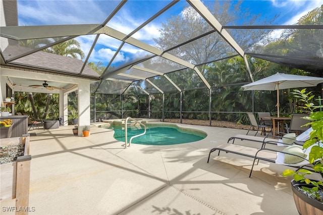 13404 Bristol Park Way, Fort Myers, FL 33913 - swimming pool with a patio, ceiling fan, a jacuzzi, and glass enclosure