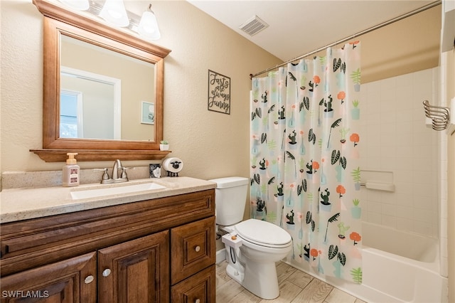 full bathroom featuring vanity, wood-type flooring, toilet, and shower / bath combo with shower curtain