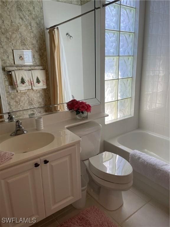 full bathroom featuring shower / tub combo with curtain, vanity, toilet, and tile patterned flooring