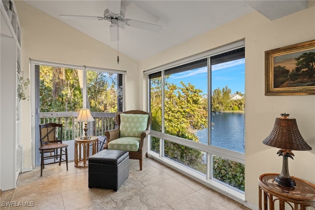 sunroom with lofted ceiling and ceiling fan