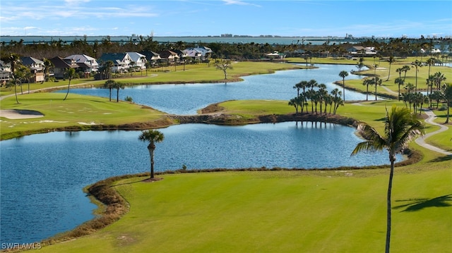 exterior space featuring a water view, a residential view, and golf course view