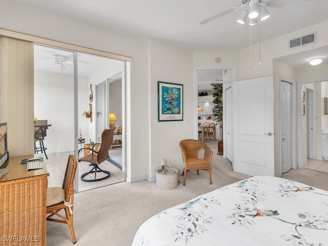 carpeted bedroom featuring ceiling fan