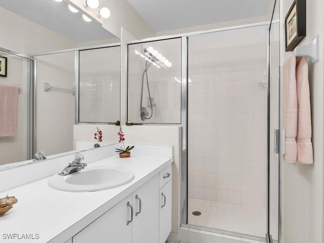 bathroom featuring vanity and walk in shower