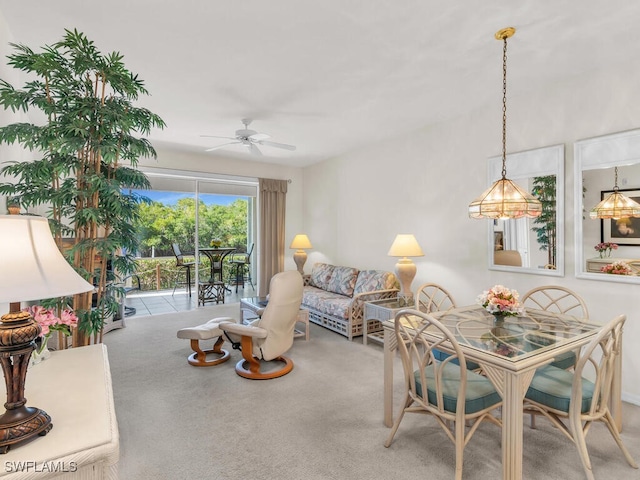 living room with light colored carpet and ceiling fan