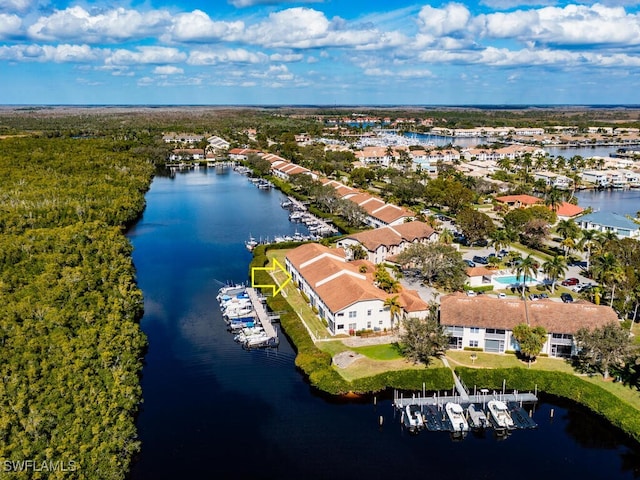 drone / aerial view with a water view