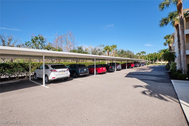 view of vehicle parking featuring a carport