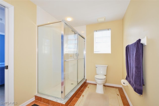 bathroom with tile patterned flooring, an enclosed shower, and toilet