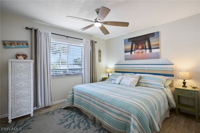 bedroom with hardwood / wood-style flooring and ceiling fan