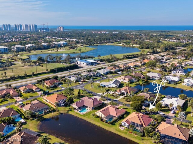 bird's eye view with a water view