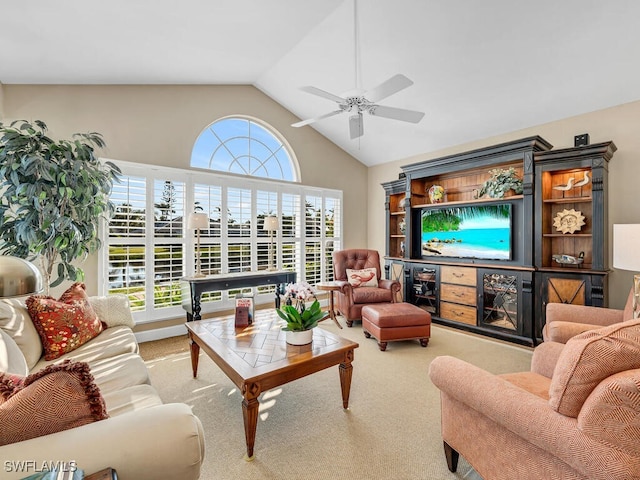 living room featuring ceiling fan, light colored carpet, and high vaulted ceiling