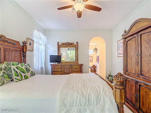 bedroom featuring crown molding and ceiling fan