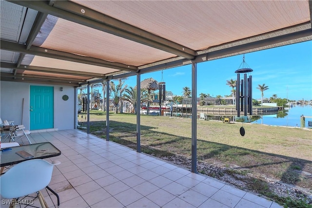 view of patio / terrace with a water view