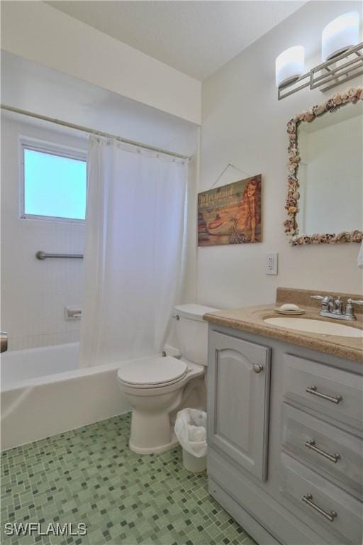 full bathroom featuring tile patterned flooring, vanity, shower / tub combo with curtain, and toilet