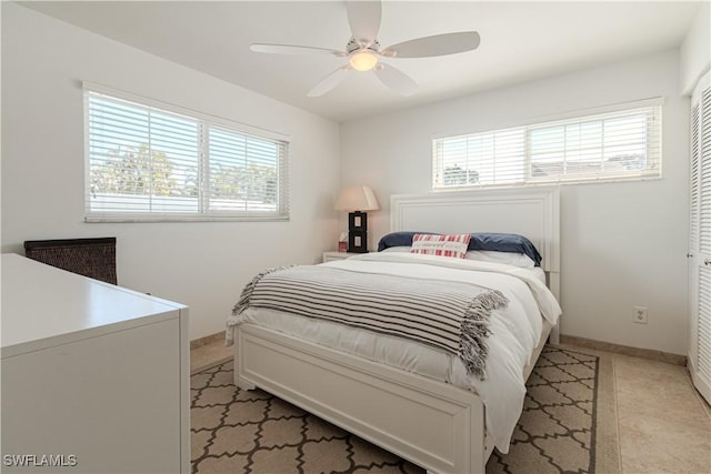 bedroom featuring a closet and ceiling fan