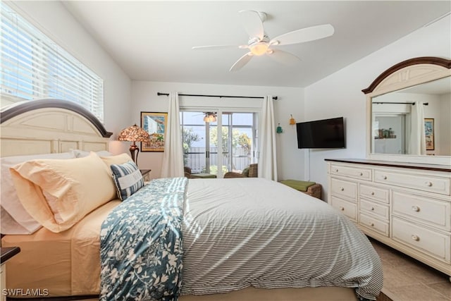 bedroom featuring ceiling fan and access to outside