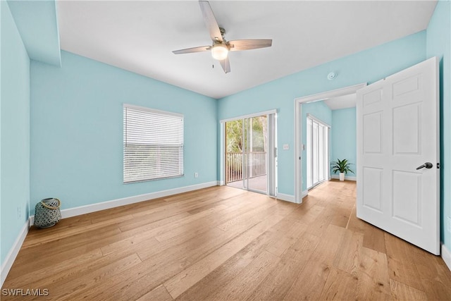 spare room featuring light hardwood / wood-style floors and ceiling fan