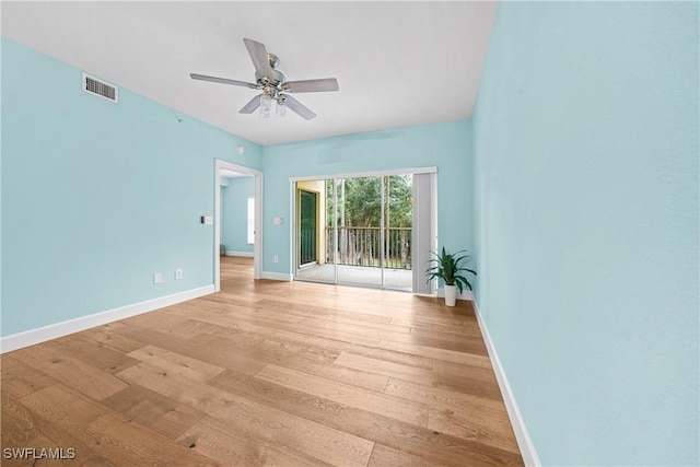 spare room featuring ceiling fan and light wood-type flooring