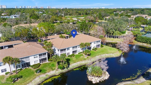 bird's eye view with a water view