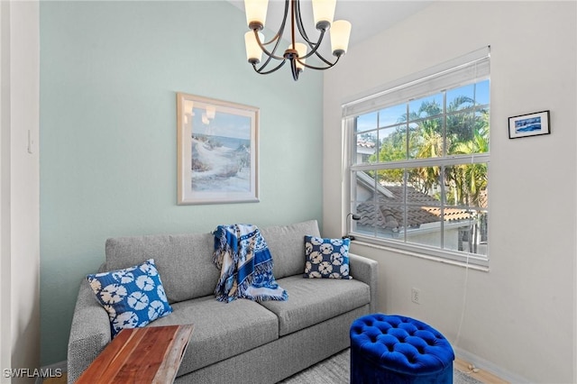 living room featuring a notable chandelier