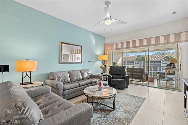 living room with light tile patterned flooring and ceiling fan