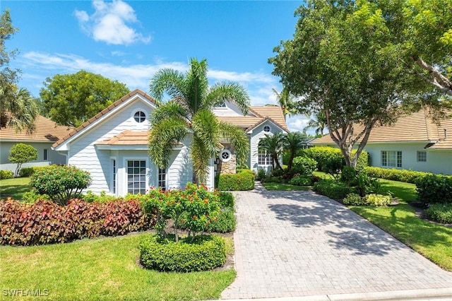 view of front of property with a front lawn