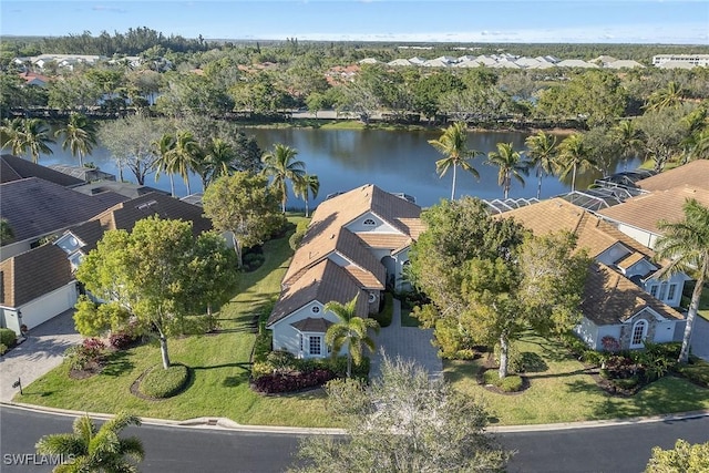 bird's eye view featuring a water view and a residential view