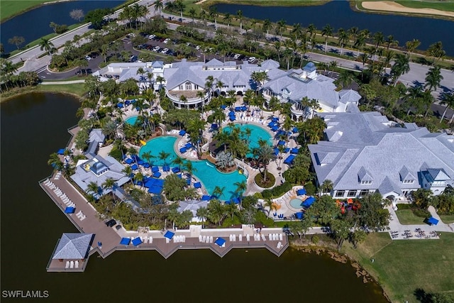 bird's eye view featuring a residential view and a water view