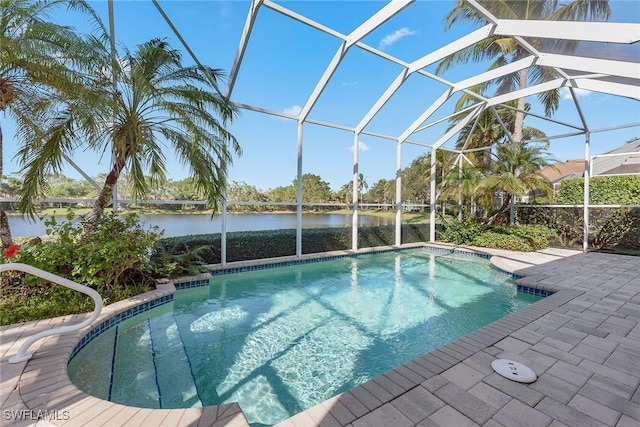 pool featuring a patio, a water view, and a lanai