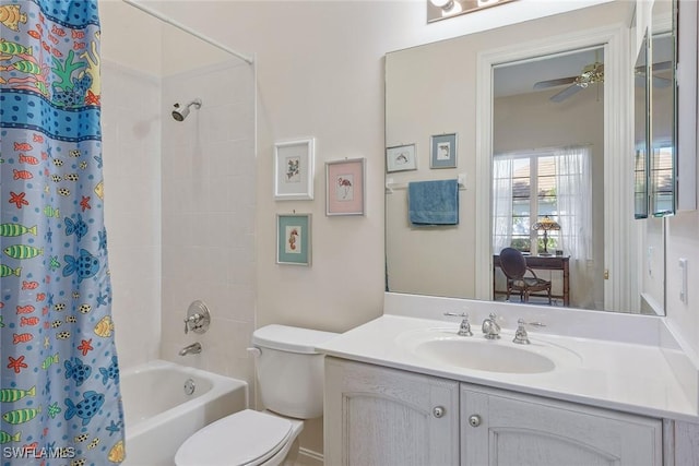 bathroom featuring vanity, toilet, and shower / bath combo with shower curtain