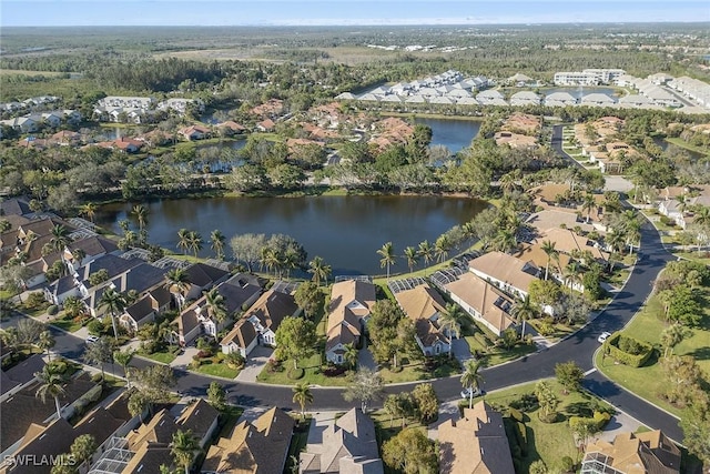 aerial view featuring a residential view and a water view