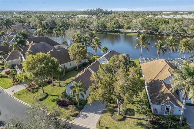 birds eye view of property with a water view and a residential view