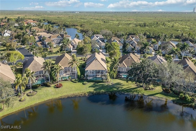 aerial view featuring a water view and a residential view