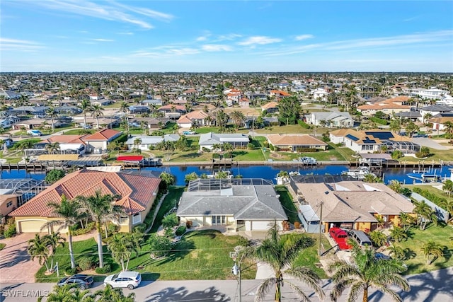 119 SW 54th St, Cape Coral, FL 33914 - aerial view of property's location featuring a nearby body of water and nearby suburban area