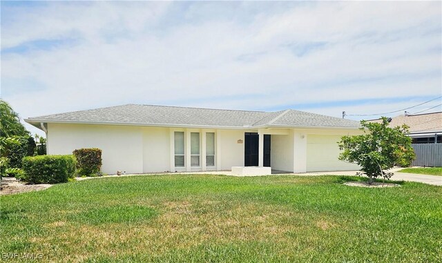 119 SW 54th St, Cape Coral, FL 33914 - ranch-style house featuring a garage, stucco siding, a front yard, and concrete driveway