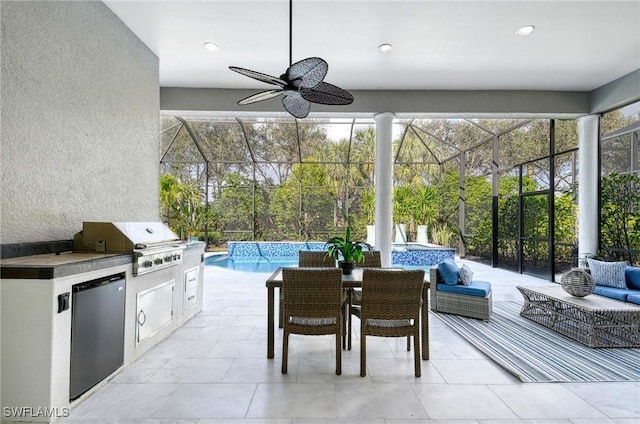 sunroom / solarium with ceiling fan