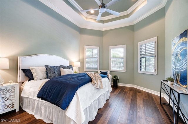 bedroom with crown molding, a towering ceiling, dark hardwood / wood-style floors, and ceiling fan