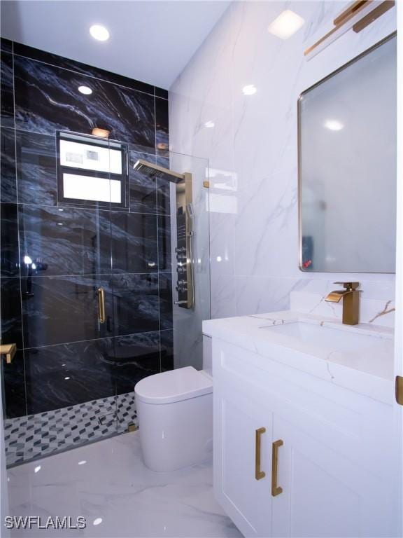 bathroom with vanity, toilet, an enclosed shower, and tile walls