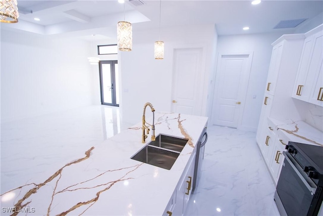 kitchen with hanging light fixtures, light stone countertops, electric range oven, and white cabinets