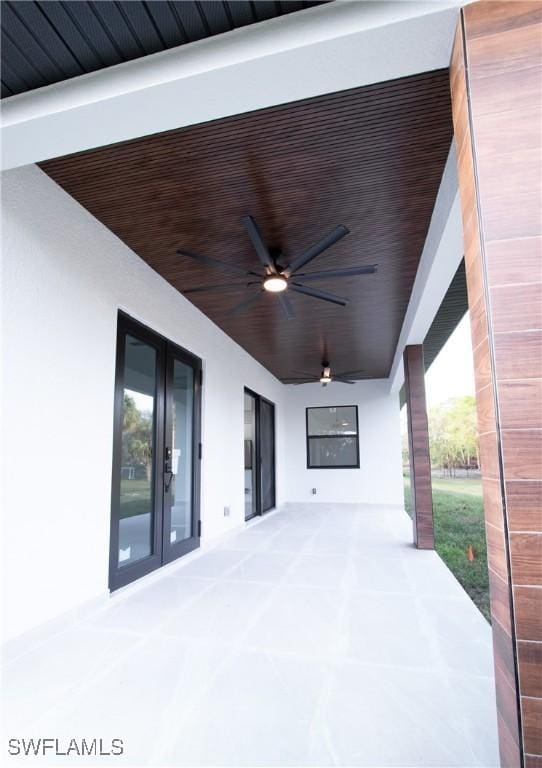 view of patio featuring ceiling fan