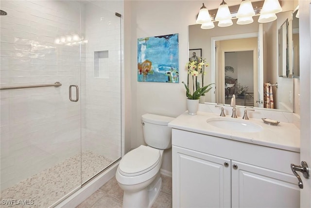 1033 Egrets Walk Cir Unit 203, Naples, FL 34108 - full bathroom with toilet, a stall shower, vanity, and tile patterned flooring