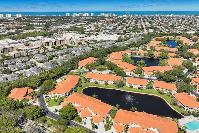 1033 Egrets Walk Cir Unit 203, Naples, FL 34108 - aerial overview of property's location with a nearby body of water and nearby urban area