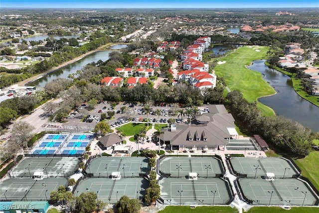 1033 Egrets Walk Cir Unit 203, Naples, FL 34108 - aerial perspective of suburban area with a nearby body of water and a golf course