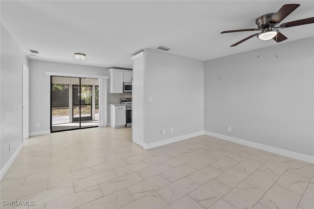 unfurnished living room featuring ceiling fan