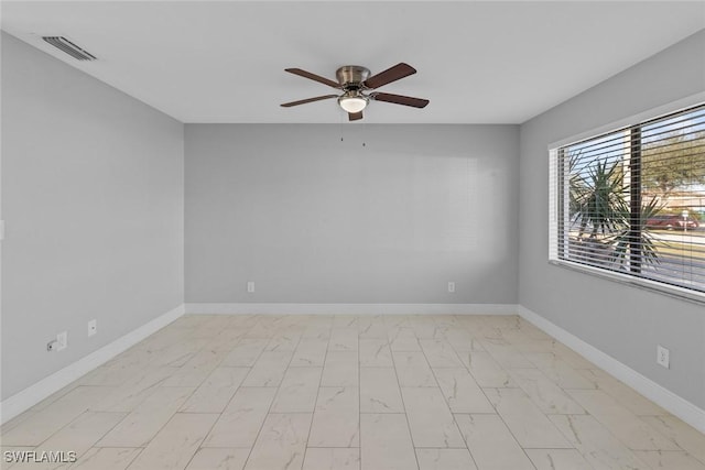 unfurnished room featuring ceiling fan