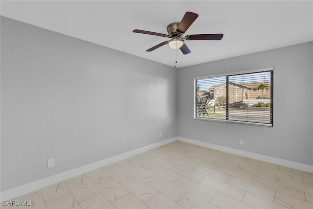 unfurnished room with ceiling fan