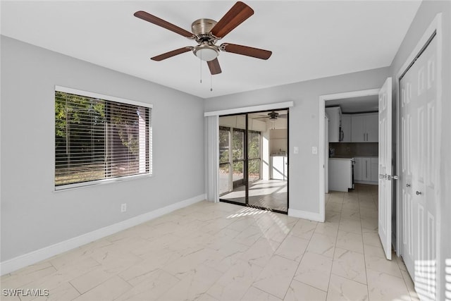 spare room featuring ceiling fan