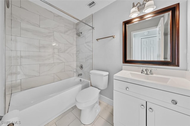 full bathroom featuring vanity, tiled shower / bath combo, and toilet