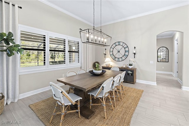 dining area with crown molding